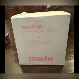 Mala Sundays candle with lavender, apricot, and sandalwood scent.